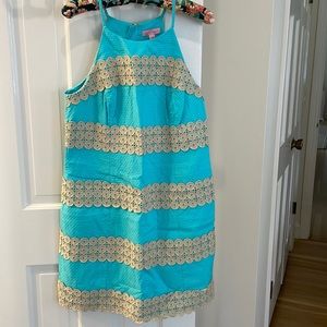 Never worn blue/gold Lilly Pulitzer dress. Size 6. Center back exposed zipper.